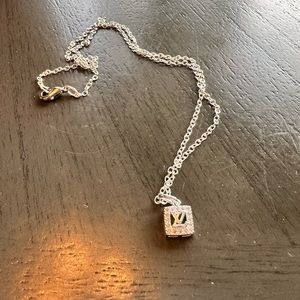 Authentic Louis Vuitton Lucite silver charm necklace